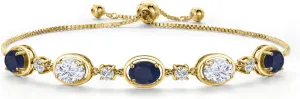 Gem Stone King 18K Yellow Gold Plated Silver Blue Sapphire and Moissanite Bracelet For Women | 4.80 Cttw | Gemstone September Birthstone | Oval 7X5MM | Fully Adjustable 9 Inch