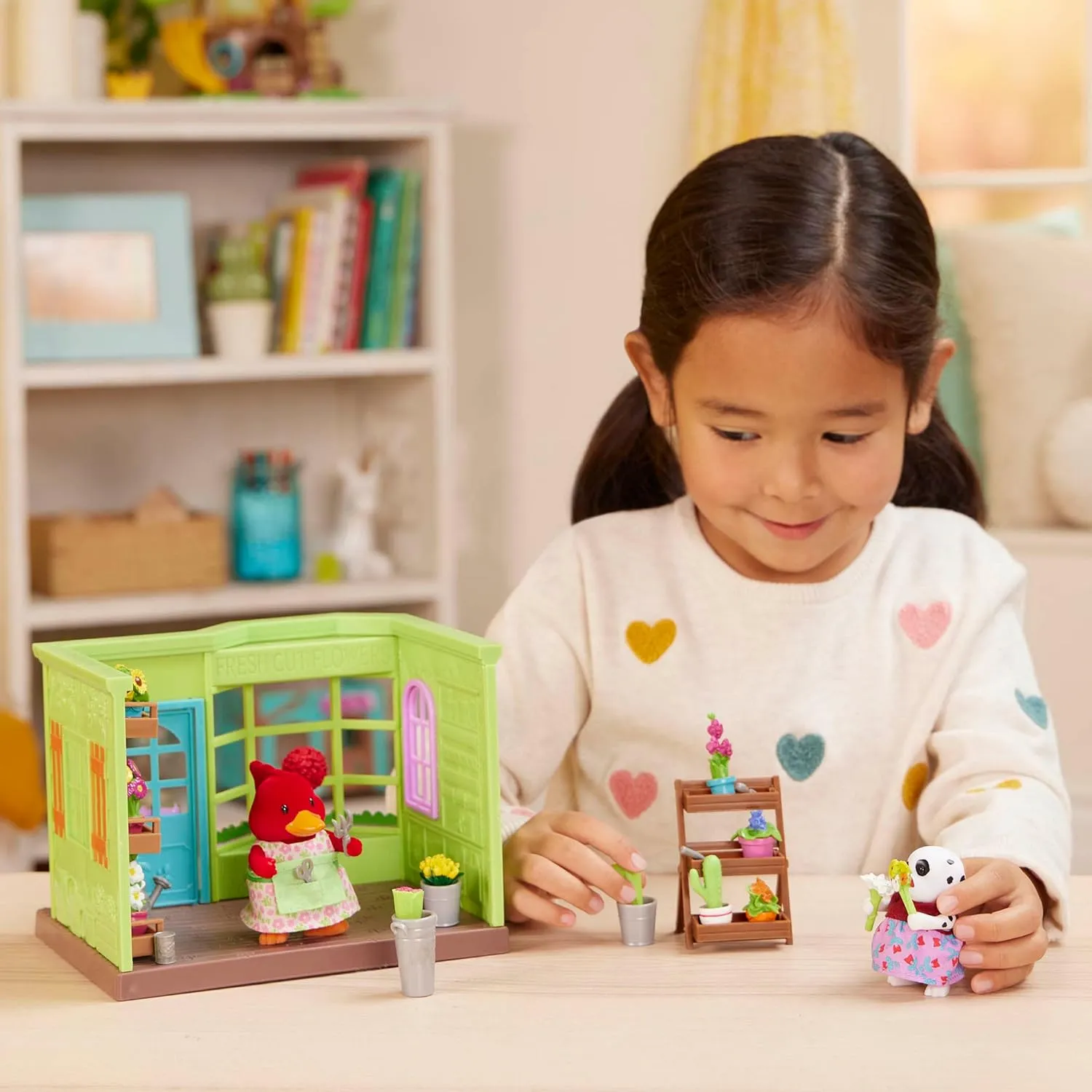 Li'l Woodzeez – Li'l Petals Flower Shop – 29Pcs Dollhouse Playset – 2 Posable Doll Figures & 1 Storybook Included – Miniature Furnitures & Accessories – Stackable Playset for Kids 3 
