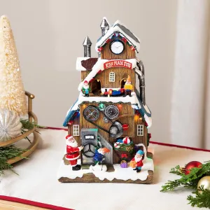 Northlight LED Lighted and Musical Christmas Village Elf Made Toys Shop - 11.5"